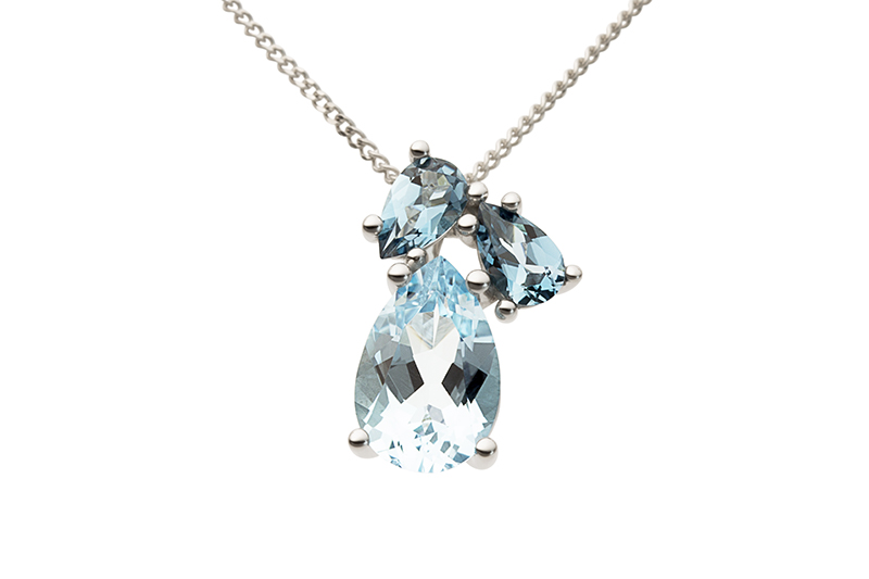 Haakonsen anheng i hvitt gull med topaser.