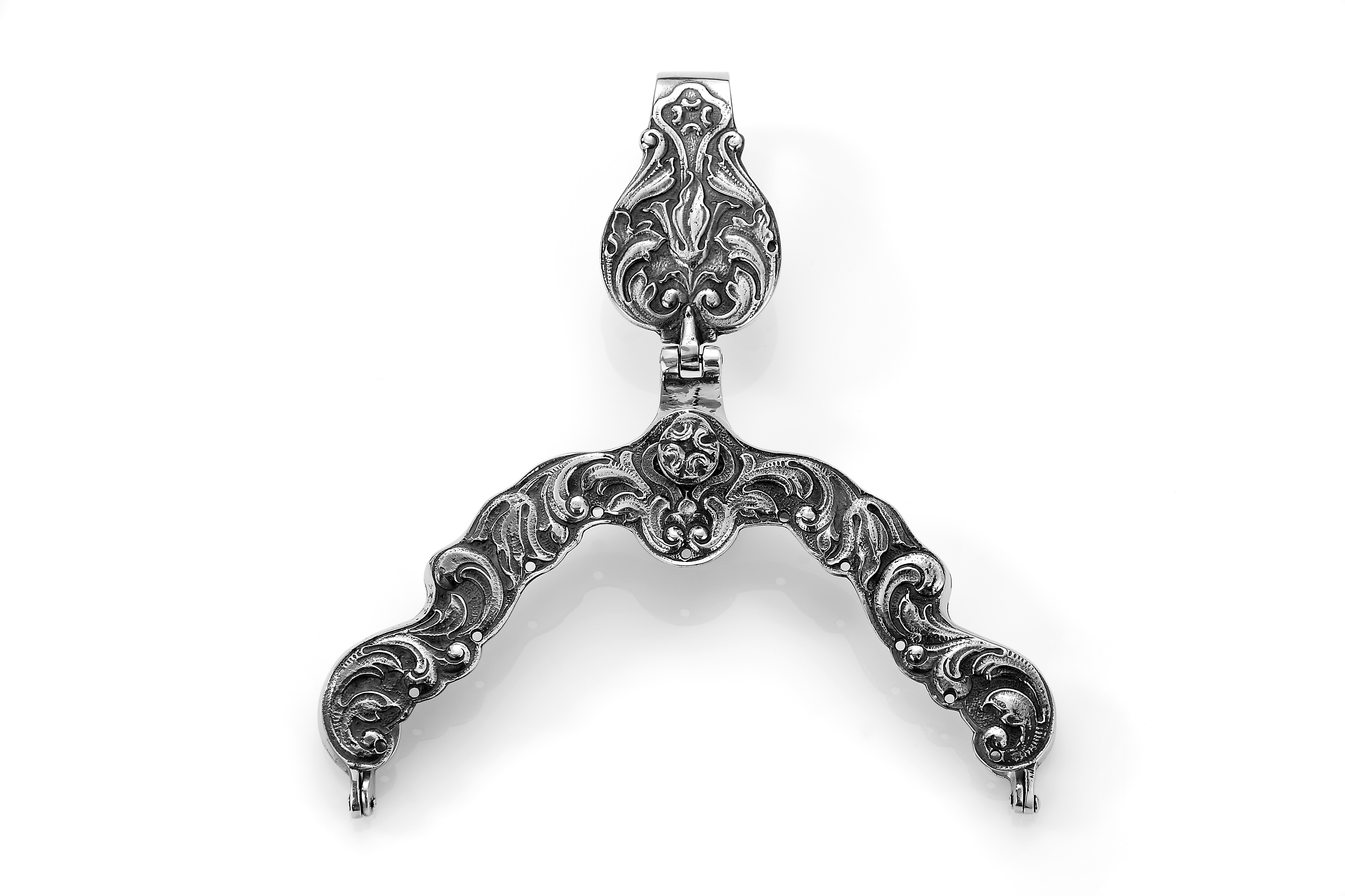 Haakonsen veskelås i sølv.