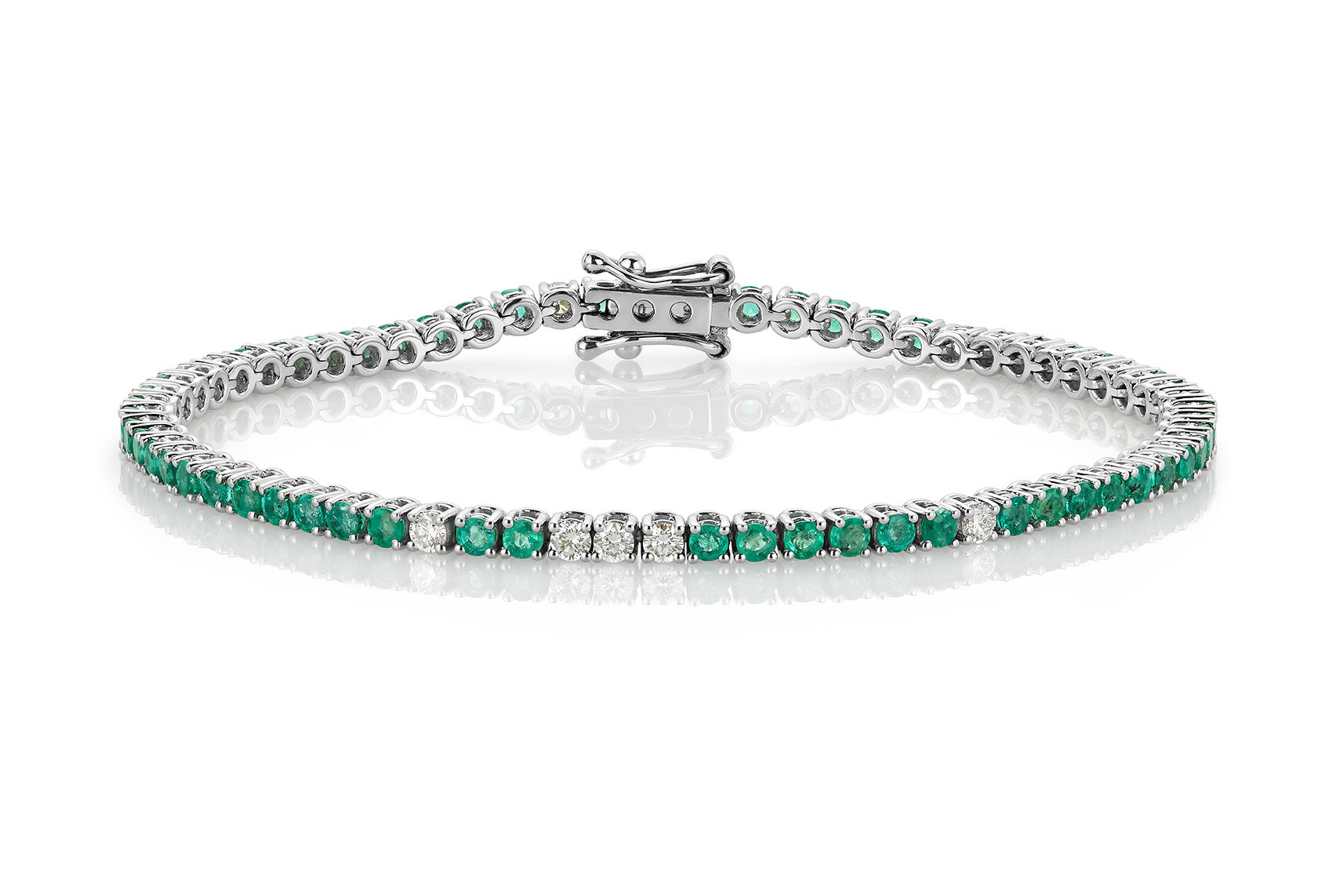 Haakonsen smaragd og diamantarmbånd i hvitt gull 0.50 ct.