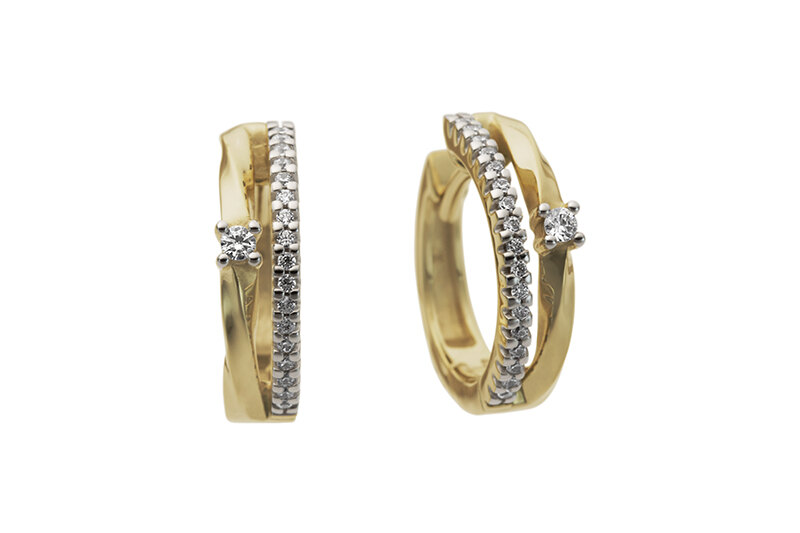 Haakonsen øreringer i gull med diamanter.