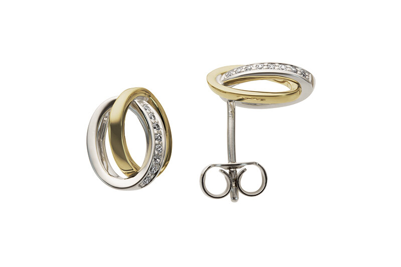 Haakonsen ørepynt i gull og hvitt gull med diamanter.