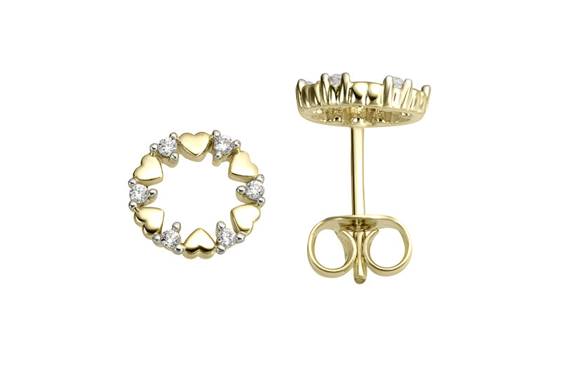 Haakonsen ørepynt i gull med diamanter.