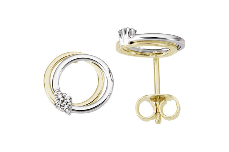 Haakonsen ørepynt i gull og hvitt gull med diamanter.