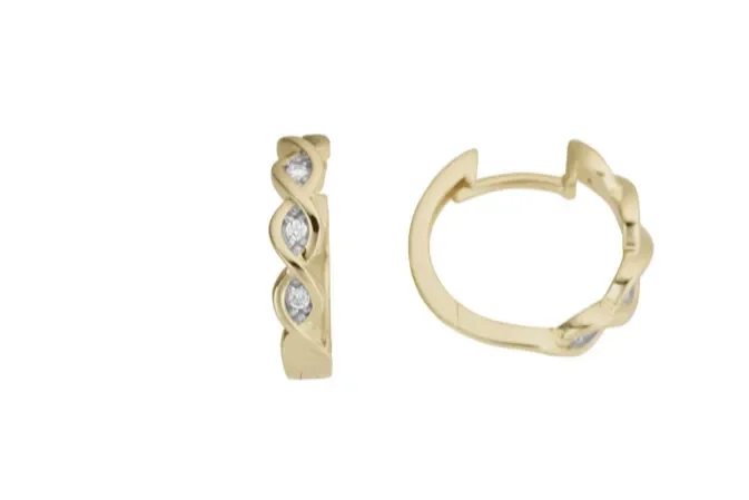 Haakonsen øreringer i gull med diamanter.