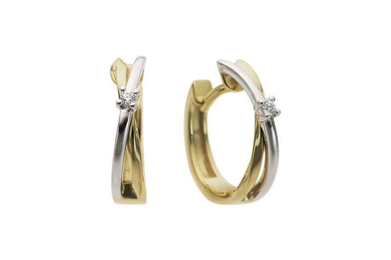 Haakonsen øreringer i gull og hvitt gull med diamant.