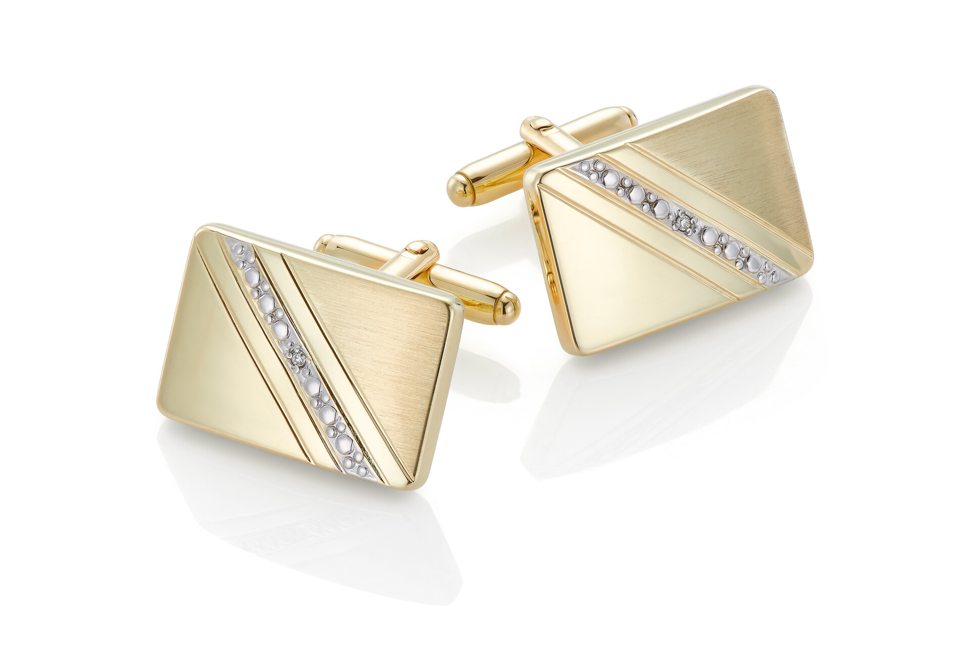 Haakonsen Herre mansjettknapper i gull med diamant.