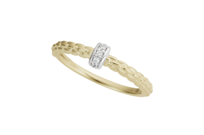 Haakonsen ring i gull og hvitt gull med diamanter.