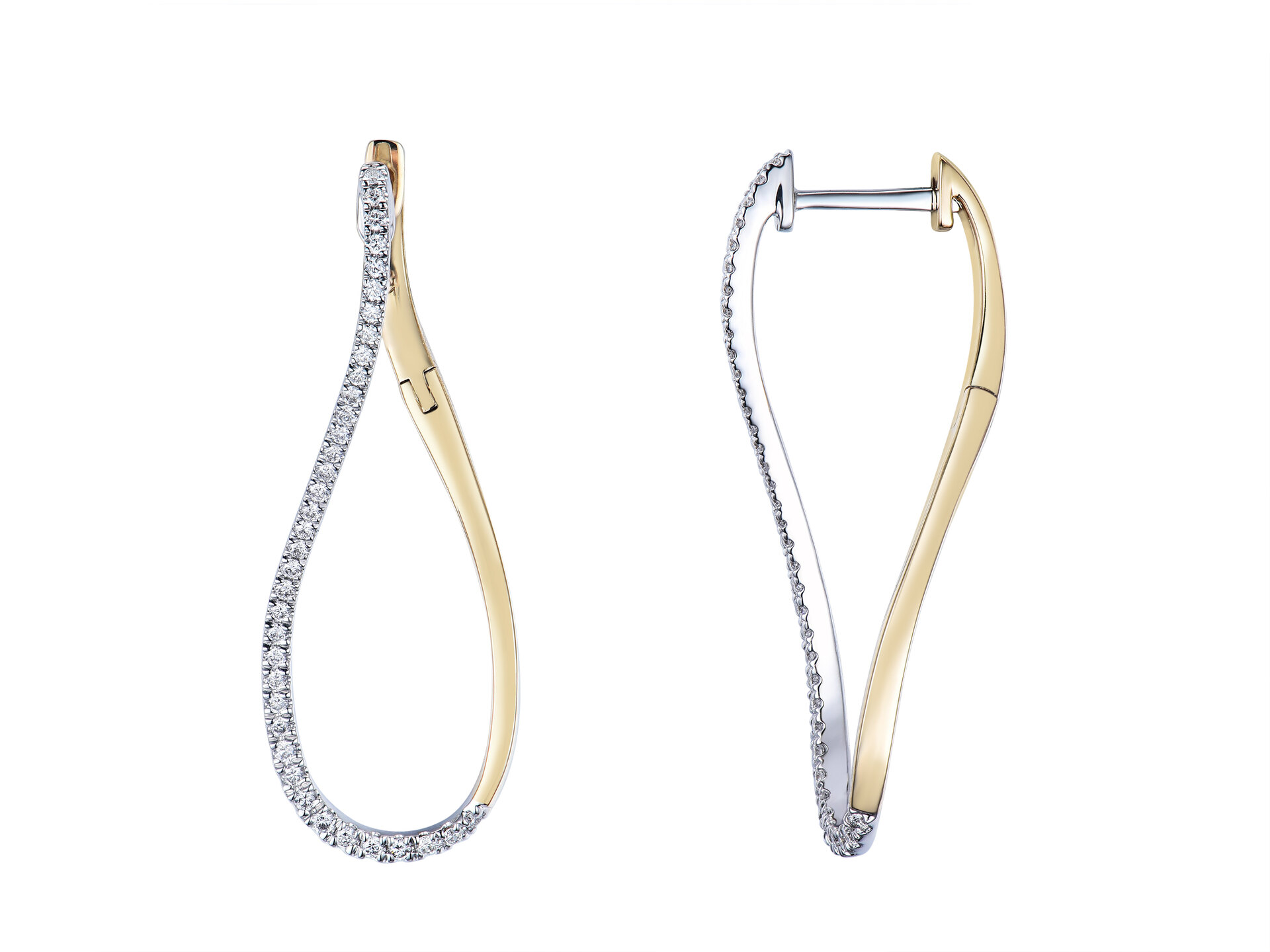 Haakonsen øreringer i gull og hvitt gull med diamanter 0.26 ct.