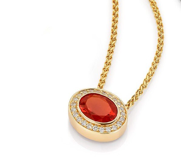 Haakonsen anheng i gull med ildopal og diamanter.